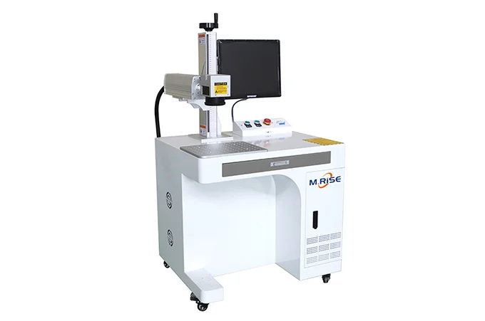 Desktop fiber laser engraver marking stainless steel part with precision serial numbers
