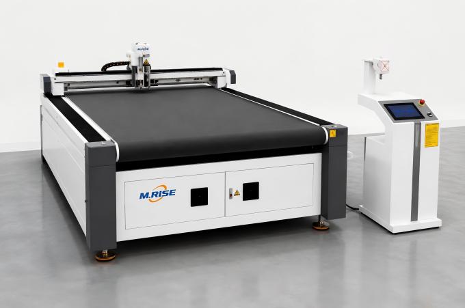 M.RISE CNC oscillating knife cutting machine left front view for precision cutting of foam, felt, cardboard and composite materials
