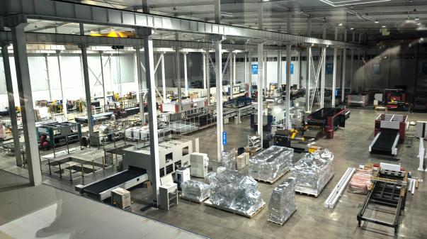 MRISECNC coil-fed laser blanking line installed in an industrial factory for automated sheet metal processing from coil.