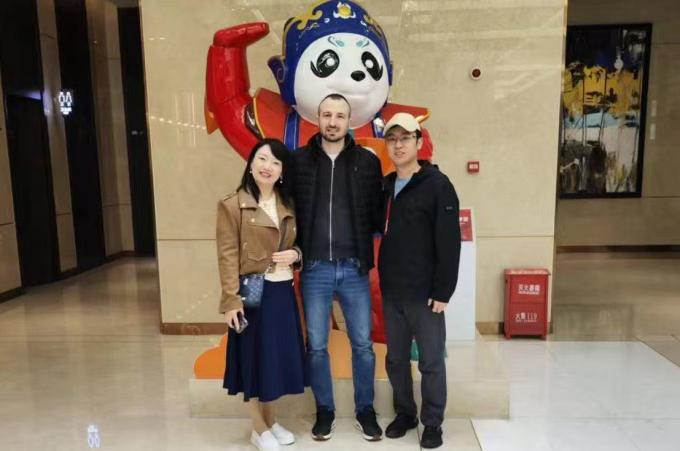 Alex, European representative from ADVENMACH (Serbia), visiting M.RISE team in China for technical collaboration on CNC digital cutting solutions.