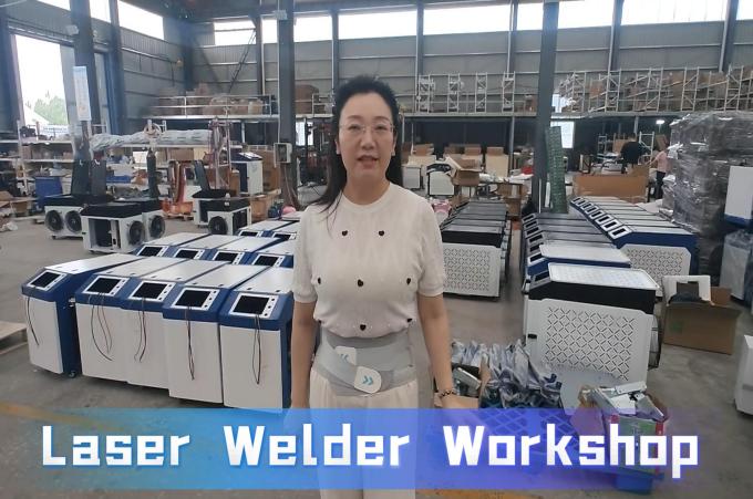 M.RISE representative Icey at the laser welding machine factory showing ample workshop inventory and chassis ready for assembly